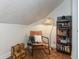 Charming reading nook with a cozy chair, soft lighting, and built-in bookcase at 8140 Springwater W Dr, Indianapolis, IN 46256