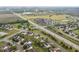Aerial view of The Landings at Sugarcreek neighborhood showing homes, streets, and surrounding commercial area at 8663 N Commonview Dr, McCordsville, IN 46055