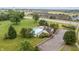 Aerial view of community pool and surrounding commercial area near the Landings at Sugarcreek community at 8663 N Commonview Dr, McCordsville, IN 46055