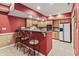 Kitchen area with granite countertops, a bar area, and stainless steel appliances at 8663 N Commonview Dr, McCordsville, IN 46055