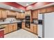 Kitchen area with wood cabinets, granite countertops, and stainless steel appliances at 8663 N Commonview Dr, McCordsville, IN 46055