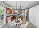 Cozy eat-in kitchen with stainless appliances and patio access for convenient outdoor dining at 8663 N Commonview Dr, McCordsville, IN 46055