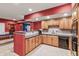 Kitchen area with wood cabinets, granite countertops, and stainless steel appliances at 8663 N Commonview Dr, McCordsville, IN 46055