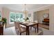 Traditional dining room featuring a chandelier and decorative molding at 9175 Lakewind Dr, Indianapolis, IN 46256