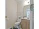 Cozy half bathroom featuring a neutral color palette and modern fixtures at 9175 Lakewind Dr, Indianapolis, IN 46256