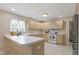 The kitchen features white countertops and light colored cabinets at 9175 Lakewind Dr, Indianapolis, IN 46256