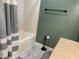 Bathroom features a tub with shower, modern hardware, and neutral color scheme at 106 9Th St, New Market, IN 47965