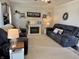 Relaxing living room with comfortable seating, a fireplace, and a cozy atmosphere at 106 9Th St, New Market, IN 47965