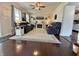 Inviting living room featuring comfy seating, a fireplace, and natural light at 106 9Th St, New Market, IN 47965