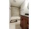 Updated bathroom with tiled shower, vanity with granite counters, and essential fixtures at 110 Highland Ave, Franklin, IN 46131