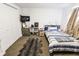 Comfortable bedroom featuring a cozy rug, natural lighting, and neutral decor at 110 Highland Ave, Franklin, IN 46131