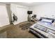 Bedroom with a cozy rug, closet, TV, and unique decorative touches at 110 Highland Ave, Franklin, IN 46131