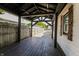 Spacious covered deck with exposed beams and wood flooring at 110 Highland Ave, Franklin, IN 46131