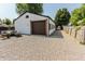 Exterior of detached garage featuring gravel parking and driveway at 110 Highland Ave, Franklin, IN 46131