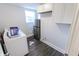 This large laundry room also has a new refrigerator and lots of cabinet space at 110 Highland Ave, Franklin, IN 46131