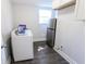 Bright laundry room with modern washer, dryer, and updated cabinetry for efficient home management at 110 Highland Ave, Franklin, IN 46131