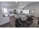 Open concept living space and kitchen featuring an island with stainless appliances and modern finishes at 110 Highland Ave, Franklin, IN 46131