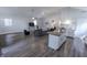 Bright living room showcasing modern finishes, open concept, and ample natural light from large windows at 110 Highland Ave, Franklin, IN 46131