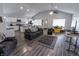 Open floor plan showcasing the kitchen island, stainless appliances, and modern finishes for easy living at 110 Highland Ave, Franklin, IN 46131
