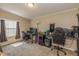 This bedroom features a dedicated workspace with multiple monitors and comfortable chairs at 1114 E 234Th St, Sheridan, IN 46069