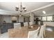 Open concept dining room with views of the living room and kitchen at 1114 E 234Th St, Sheridan, IN 46069