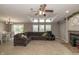 Spacious living room flowing into dining area, featuring fireplace and natural light at 1114 E 234Th St, Sheridan, IN 46069