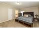 Comfortable main bedroom with ensuite bathroom and a calm, neutral palette at 1114 E 234Th St, Sheridan, IN 46069