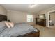 Cozy main bedroom featuring a comfortable bed, dresser, and bright natural light at 1114 E 234Th St, Sheridan, IN 46069