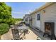 Outdoor patio features comfortable seating, grill, and a peaceful backyard with nice views at 1114 E 234Th St, Sheridan, IN 46069