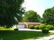 Charming single-story home with lush lawn, mature trees, and attached garage at 11343 E 191St St, Noblesville, IN 46060