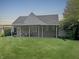 Back exterior view showcases the home's spacious backyard at 1141 N Shadeland Ave, Indianapolis, IN 46219