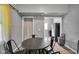 Cozy dining area with a round table and four chairs at 1141 N Shadeland Ave, Indianapolis, IN 46219