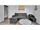 Cozy living room with a comfortable sofa, and modern decor at 1141 N Shadeland Ave, Indianapolis, IN 46219