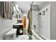 Cozy bathroom featuring a vanity sink, toilet, and bathtub with showerhead at 120 Hoss Rd, Indianapolis, IN 46217