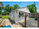 Detached garage featuring a fenced yard area at 120 Hoss Rd, Indianapolis, IN 46217