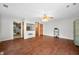 Expansive living room with hardwood floors, ceiling fan, and neutral wall color at 120 Hoss Rd, Indianapolis, IN 46217