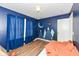 Blue bedroom with themed wall art and natural light, creating an inspiring space at 1217 Old Vines Trl, Greenwood, IN 46143
