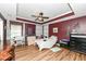 This bedroom has wood floors and a ceiling fan at 1217 Old Vines Trl, Greenwood, IN 46143