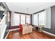 This dining room features wood floors and a chandelier hanging over the table at 1217 Old Vines Trl, Greenwood, IN 46143