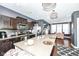 Stylish kitchen with stainless steel appliances, a center island, dark wood cabinetry, and modern lighting fixtures at 1217 Old Vines Trl, Greenwood, IN 46143