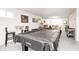Basement is set up for Gathering fun with a pool table and other entertaining options at 13068 Lamarque Pl, Fishers, IN 46038