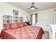 Cozy primary bedroom features a ceiling fan and a crib, perfect for a growing Gathering at 13068 Lamarque Pl, Fishers, IN 46038