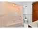 Well-lit bathroom with a shower-tub combination and neutral finishes at 1346 W 27Th St, Indianapolis, IN 46208