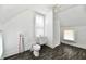 Bright bathroom features a toilet, vanity, and shower unit, perfect for a quick refresh at 1346 W 27Th St, Indianapolis, IN 46208