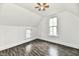 Comfortable bedroom with fresh paint, two windows for natural light, and hardwood floors at 1346 W 27Th St, Indianapolis, IN 46208