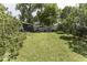 Large backyard with shed and mature trees at 1393 Wayne St, Noblesville, IN 46060
