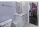 Bathroom features single vanity, tiled floor and blue walls at 1393 Wayne St, Noblesville, IN 46060