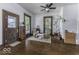 Cozy living room featuring hardwood floors, vintage furniture, and a bright, airy atmosphere at 1393 Wayne St, Noblesville, IN 46060