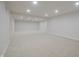Spacious basement with neutral carpet and recessed lighting for a bright and open feel at 15201 Slateford Rd, Noblesville, IN 46062
