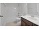 This bathroom features a toilet, shower and bath, vanity and tile flooring at 15201 Slateford Rd, Noblesville, IN 46062